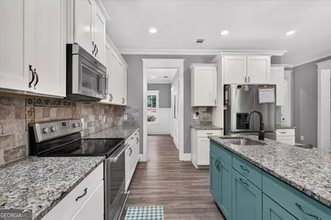 Kitchen - 490 Gregory Rd, Covington, GA 30014 photo 3 of 4