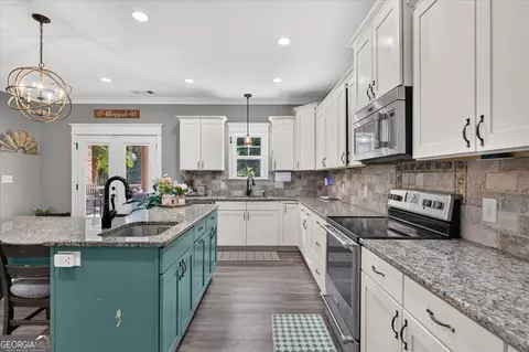 Kitchen - 490 Gregory Rd, Covington, GA 30014 photo 4 of 4