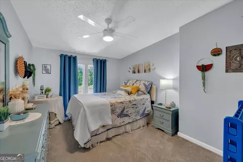 Bedroom - 121 W Entrekin Rd, Cobb, GA 31735 photo 4 of 8