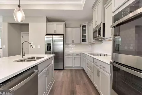 Kitchen - 293 Corncrib Bnd, Dacula, GA 30019 photo 2 of 2