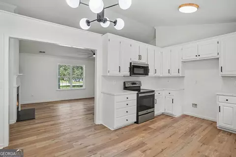 Kitchen - 305 Veal Rd, Covington, GA 30016 photo 2 of 2