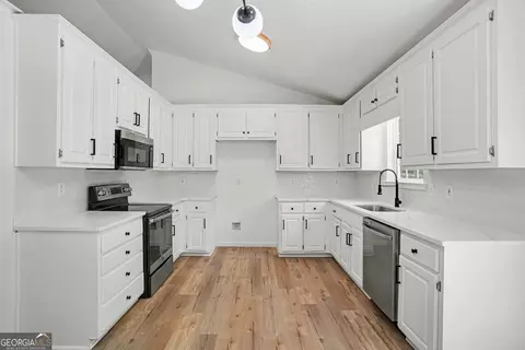 Kitchen - 305 Veal Rd, Covington, GA 30016 photo 1 of 2