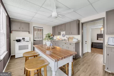 Kitchen - 145 Peach St, Commerce, GA 30529 photo 3 of 5