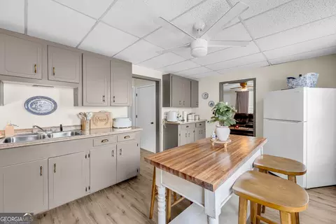 Kitchen - 145 Peach St, Commerce, GA 30529 photo 4 of 5