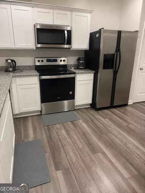 Kitchen - 302 Knightsbridge Ln, Winder, GA 30680 photo 2 of 5