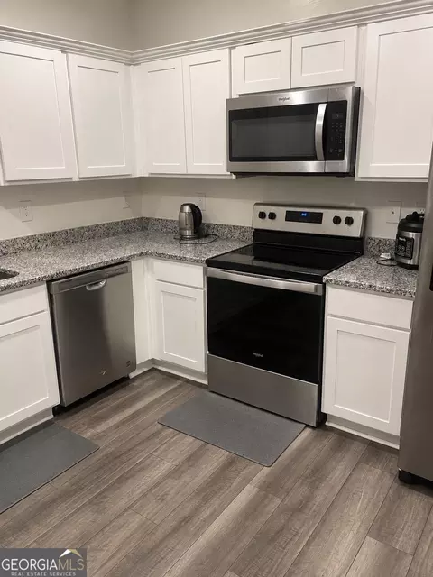Kitchen - 302 Knightsbridge Ln, Winder, GA 30680 photo 3 of 5