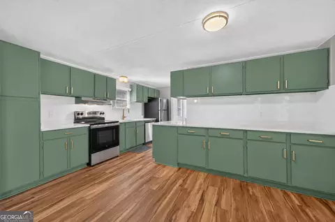 Kitchen - 440 Smith Rd, Haddock, GA 31033 photo 2 of 2
