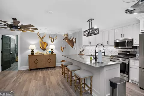 Kitchen - 109 Forest Pointe Dr, Forsyth, GA 31029 photo 5 of 10