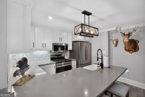 Kitchen - 109 Forest Pointe Dr, Forsyth, GA 31029 photo 4 of 10