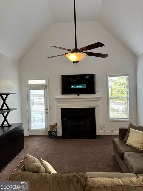 Living - 16 Plum Blossom Ln, Hampton, GA 30228 photo 2 of 6