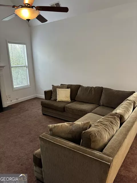 Living - 16 Plum Blossom Ln, Hampton, GA 30228 photo 3 of 6