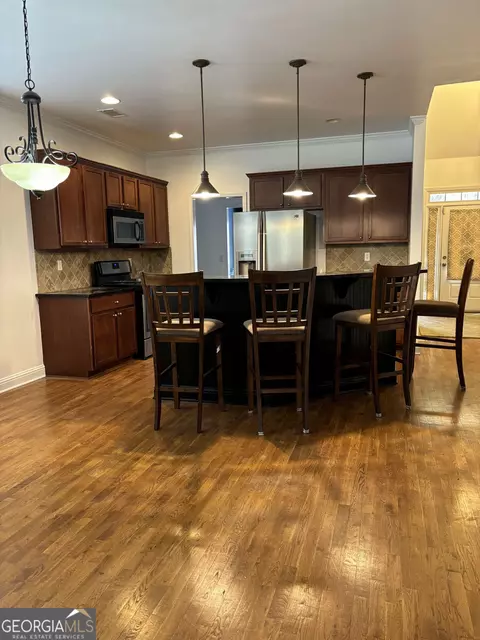Kitchen - 16 Plum Blossom Ln, Hampton, GA 30228 photo 2 of 5
