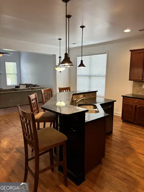 Kitchen - 16 Plum Blossom Ln, Hampton, GA 30228 photo 3 of 5