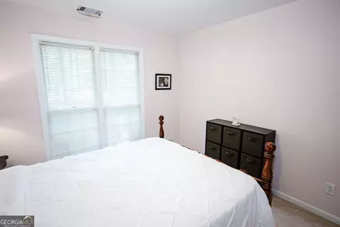 Bedroom - 405 Radcliffe Trce, Covington, GA 30016 photo 5 of 10