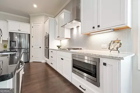 Kitchen - 213 Fieldbrook Xing, Canton, GA 30115 photo 4 of 9