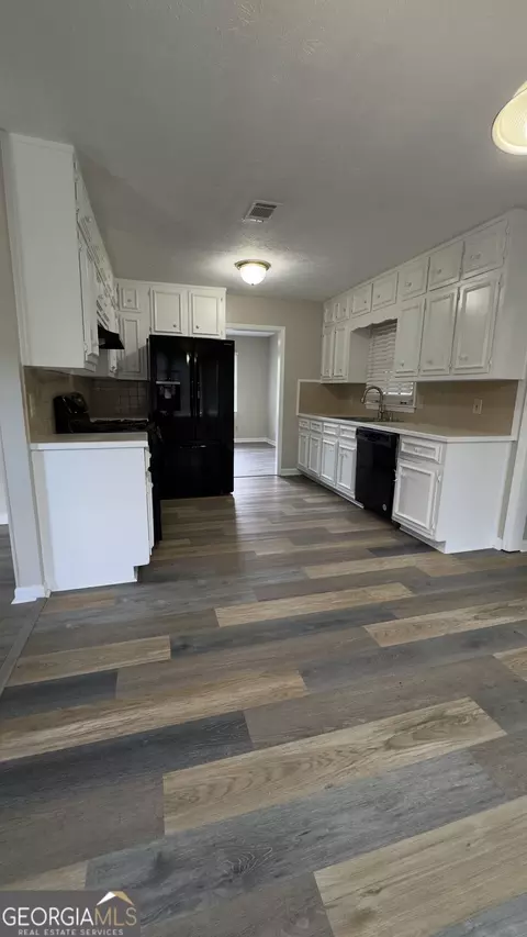 Kitchen - 1050 Forest Heights Rd, Stone Mountain, GA 30083 photo 2 of 2
