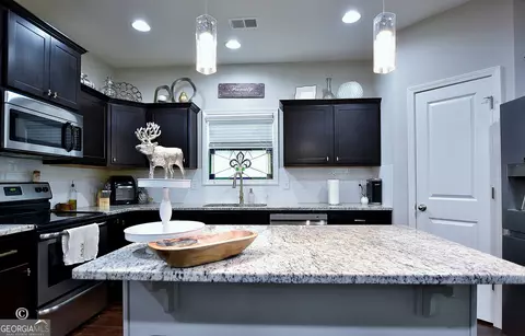 Kitchen - 907 Big Sky Dr, Hamilton, GA 31811 photo 2 of 3