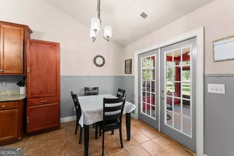 Dining - 286 Middle Fork Ln, Carnesville, GA 30521 photo 2 of 2