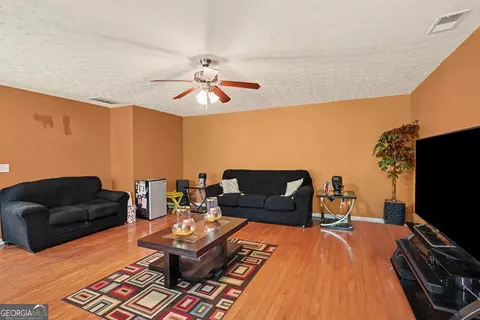 Living - 266 Millstone Dr, Hampton, GA 30228 photo 2 of 4