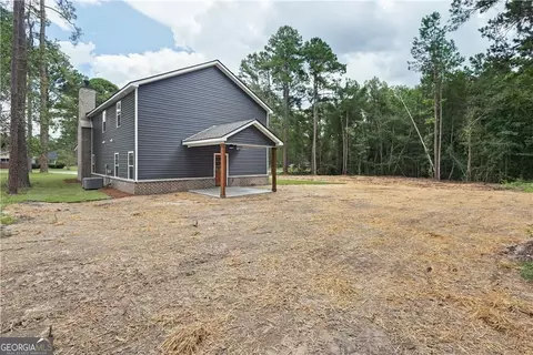 Exterior - 406 S Ash St, Springfield, GA 31329 photo 6 of 7