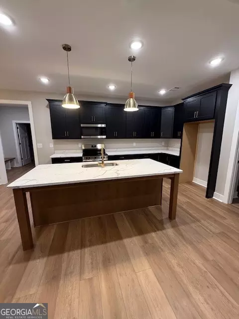 Kitchen - 603 Silver Dollar Rd, Barnesville, GA 30204 photo 3 of 4