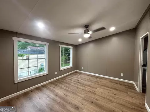 Living - 225 Stratford Dr, Hampton, GA 30228 photo 5 of 6