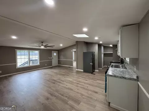 Living - 225 Stratford Dr, Hampton, GA 30228 photo 4 of 6