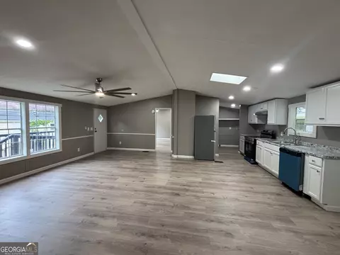 Living - 225 Stratford Dr, Hampton, GA 30228 photo 3 of 6