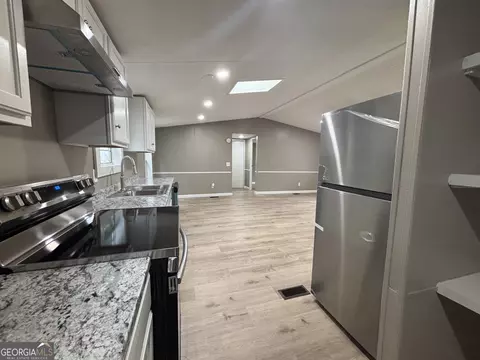 Kitchen - 225 Stratford Dr, Hampton, GA 30228 photo 2 of 2