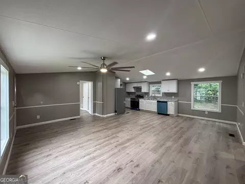 Living - 225 Stratford Dr, Hampton, GA 30228 photo 2 of 6
