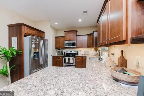 Kitchen - 211 Wild Azalea Dr, Perry, GA 31069 photo 2 of 3