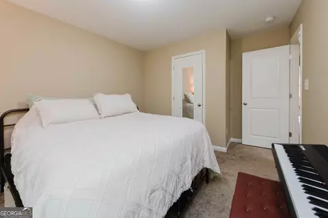 Bedroom - 211 Wild Azalea Dr, Perry, GA 31069 photo 11 of 15