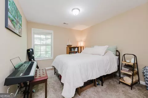 Bedroom - 211 Wild Azalea Dr, Perry, GA 31069 photo 8 of 15