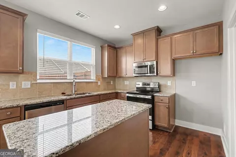Kitchen - 7666 Squire Ct, Fairburn, GA 30213 photo 3 of 3