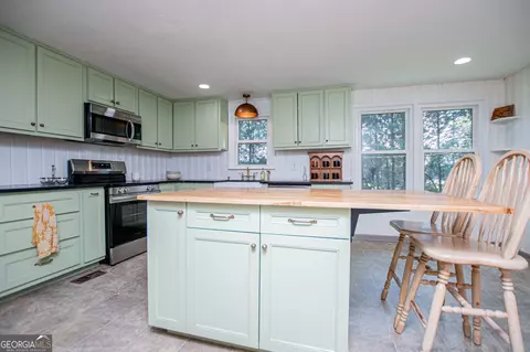 Kitchen - 105 Sharp Dr, Carrollton, GA 30117 photo 9 of 13