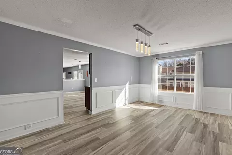 Living - 541 Hamlet Dr, Hampton, GA 30228 photo 5 of 7