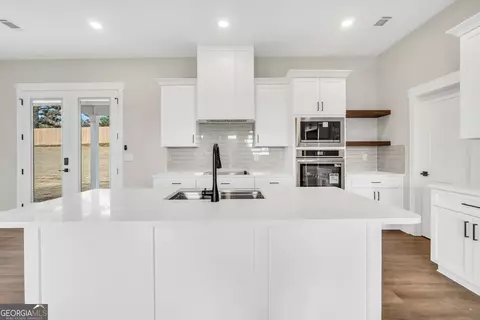 Kitchen - 277 E Knight Rd, Mcdonough, GA 30252 photo 2 of 2