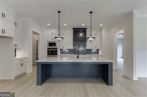 Kitchen - 5430 Settingdown Rd, Cumming, GA 30041 photo 2 of 4