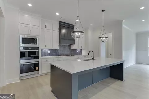 Kitchen - 5430 Settingdown Rd, Cumming, GA 30041 photo 3 of 4
