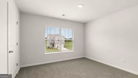 Bedroom - 8156 Coldstream Dr, Fairburn, GA 30213 photo 5 of 6