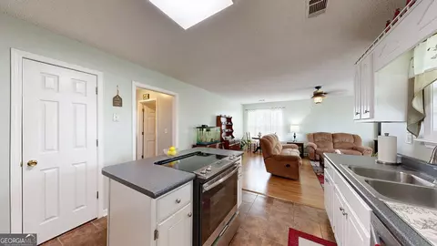 Kitchen - 157 Scarlett Ohara Dr, Ailey, GA 30410 photo 4 of 4