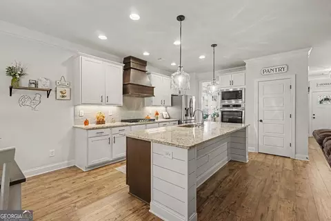 Kitchen - 588 Calgary Downs Dr, Winder, GA 30680 photo 2 of 3