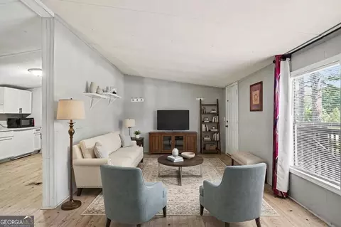 Living - 915 Steele Dr, Hampton, GA 30228 photo 1 of 4