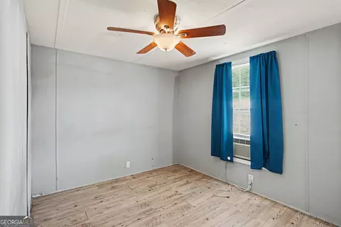 Bedroom - 915 Steele Dr, Hampton, GA 30228 photo 8 of 9