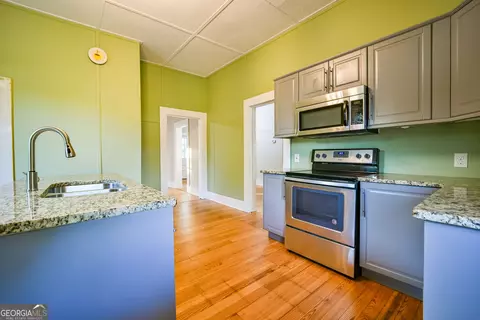Kitchen - 6 N Broad St, Covington, GA 30014 photo 2 of 2