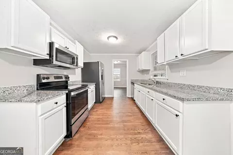 Kitchen - 10134 Westview Dr SW, Covington, GA 30014 photo 2 of 2