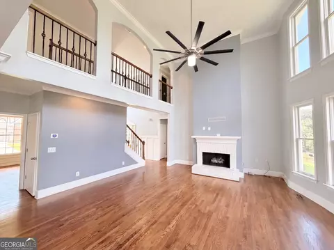 Living - 1639 Mapmaker Dr, Dacula, GA 30019 photo 3 of 5