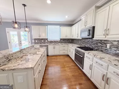 Kitchen - 1639 Mapmaker Dr, Dacula, GA 30019 photo 3 of 3