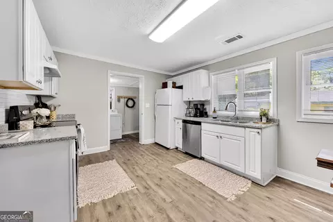 Kitchen - 411 Ash St, Monroe, GA 30655 photo 2 of 4