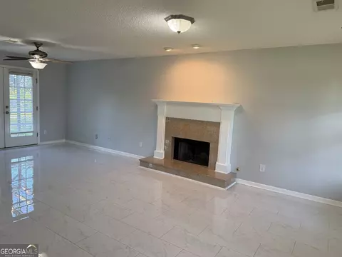 Living - 152 Moss Pointe Dr, Mcdonough, GA 30253 photo 1 of 4